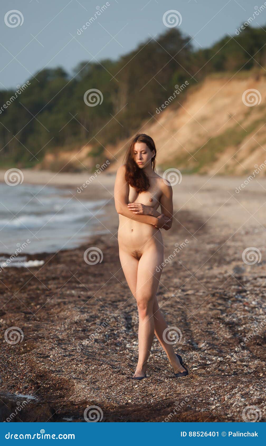 nudes walking on beach