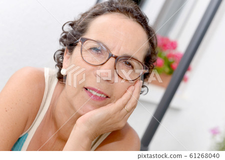 Middle Aged Brunette Woman coming back